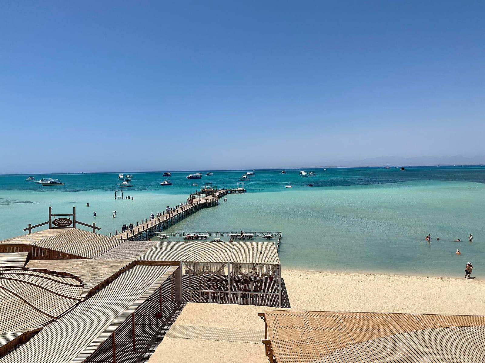 Jetty and turquoise water at Orange Bay, Giftun