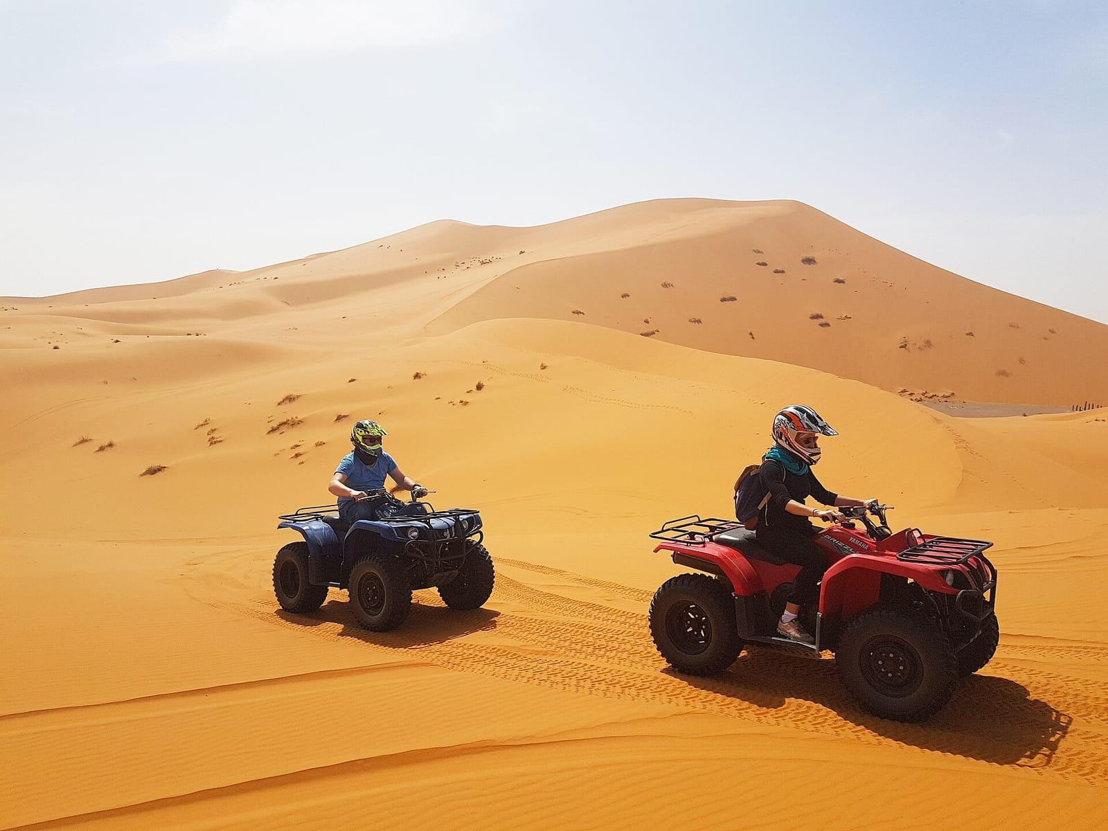 Line of quad bikes ready for a desert safari